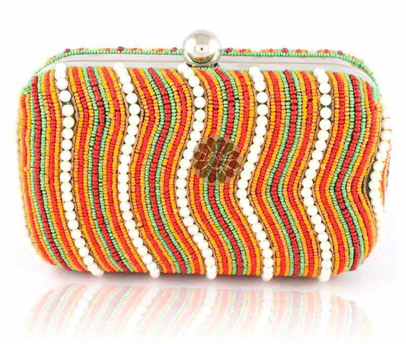 Vogue Crafts & Designs Pvt. Ltd. manufactures Magnetic Closure Beaded Clutch at wholesale price.